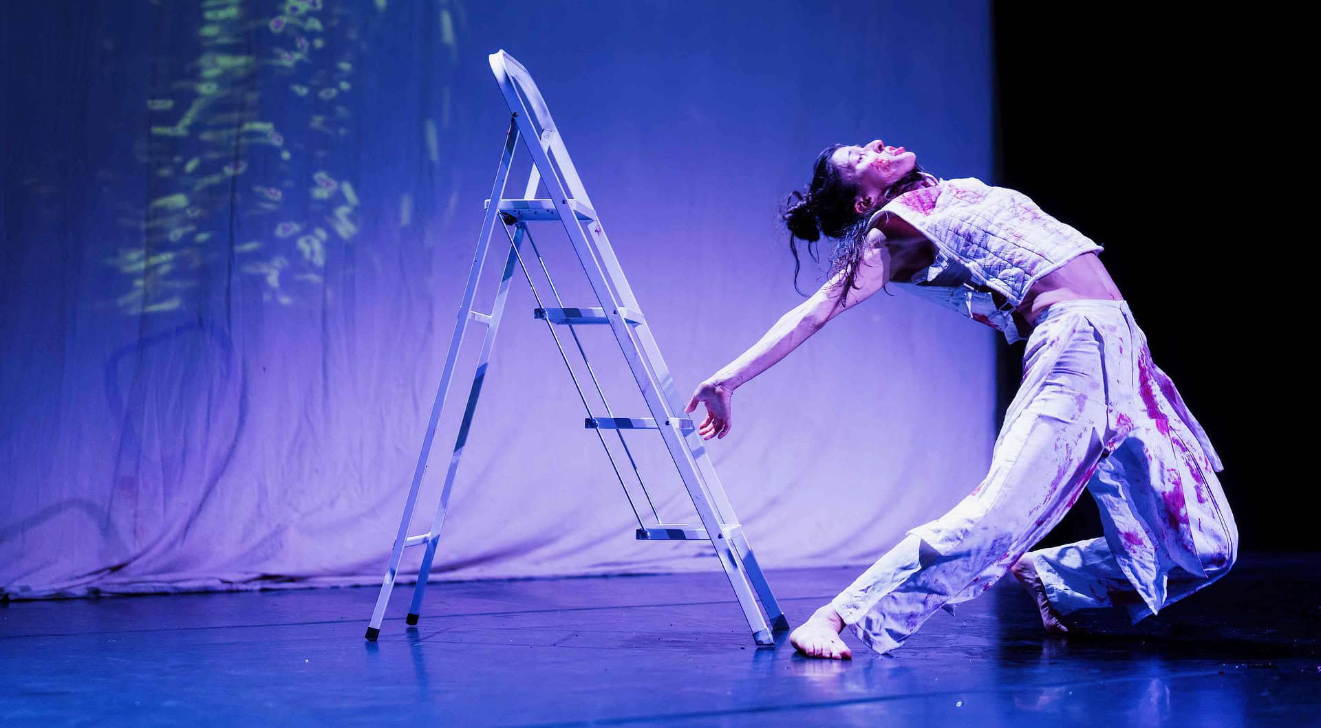 Gabriela Flarys performing Deluge on stage