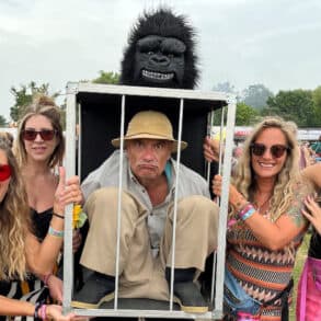 Festival Goers with man dressed in gorilla outfit