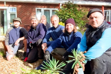 The C.A.R. Gardens team on planting day, with Mountbatten volunteer gardener, Jenny Peddar, centre back and Rob Mew, centre front