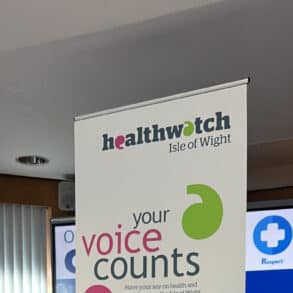 Healthwatch officer (Engagement) Nathan Holt talking to Cancer Pathway Care Navigator at St Mary's