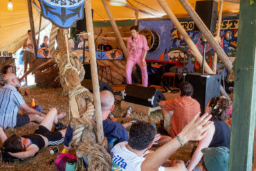 Lily Blacksell performing on stage at Glastonbury