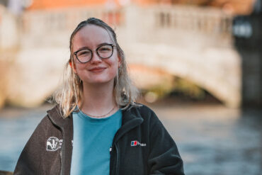 Lorna Selby standing by a river