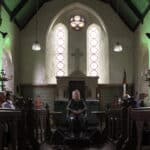 Visitors at 'Translating Frequencies639', All Saints’ Church, Calbourne, 2025. Photo Credit Pete Johnstone