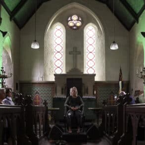 Visitors at 'Translating Frequencies639', All Saints’ Church, Calbourne, 2025. Photo Credit Pete Johnstone