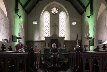 Visitors at 'Translating Frequencies639', All Saints’ Church, Calbourne, 2025. Photo Credit Pete Johnstone