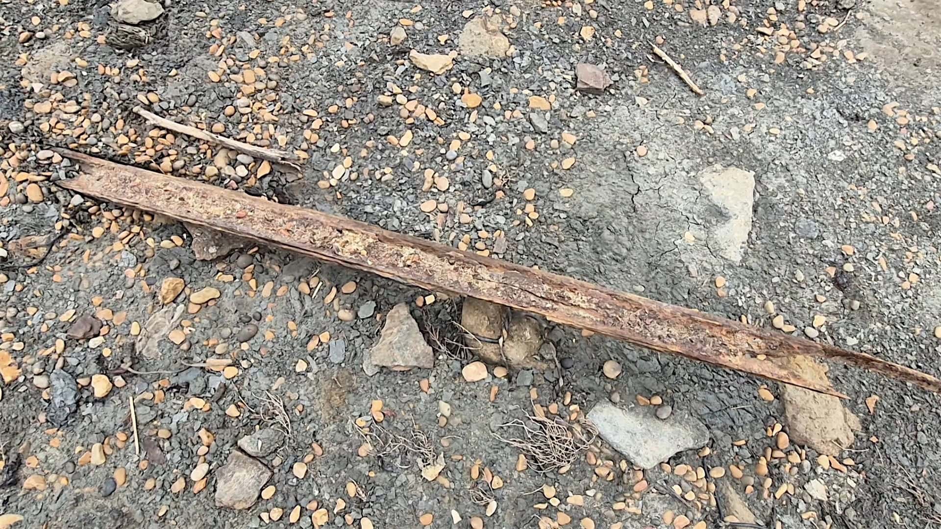 Old steel rail on the beach