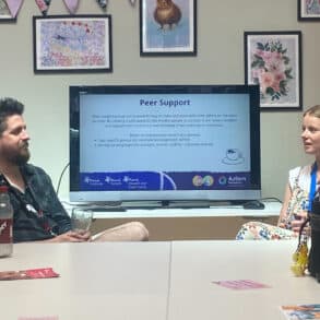 People chatting at the Autism/ADHD Hub