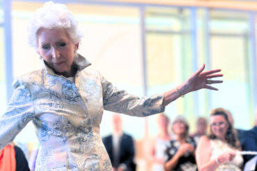 Mary Johnston-Taylor, longtime support of Mountbatten Isle of Wight, models an outfit by Sue Bonham