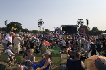 People on chairs and blankets at IW festival