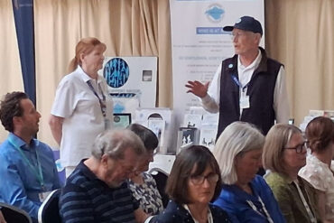 Alan Taylor (background right)