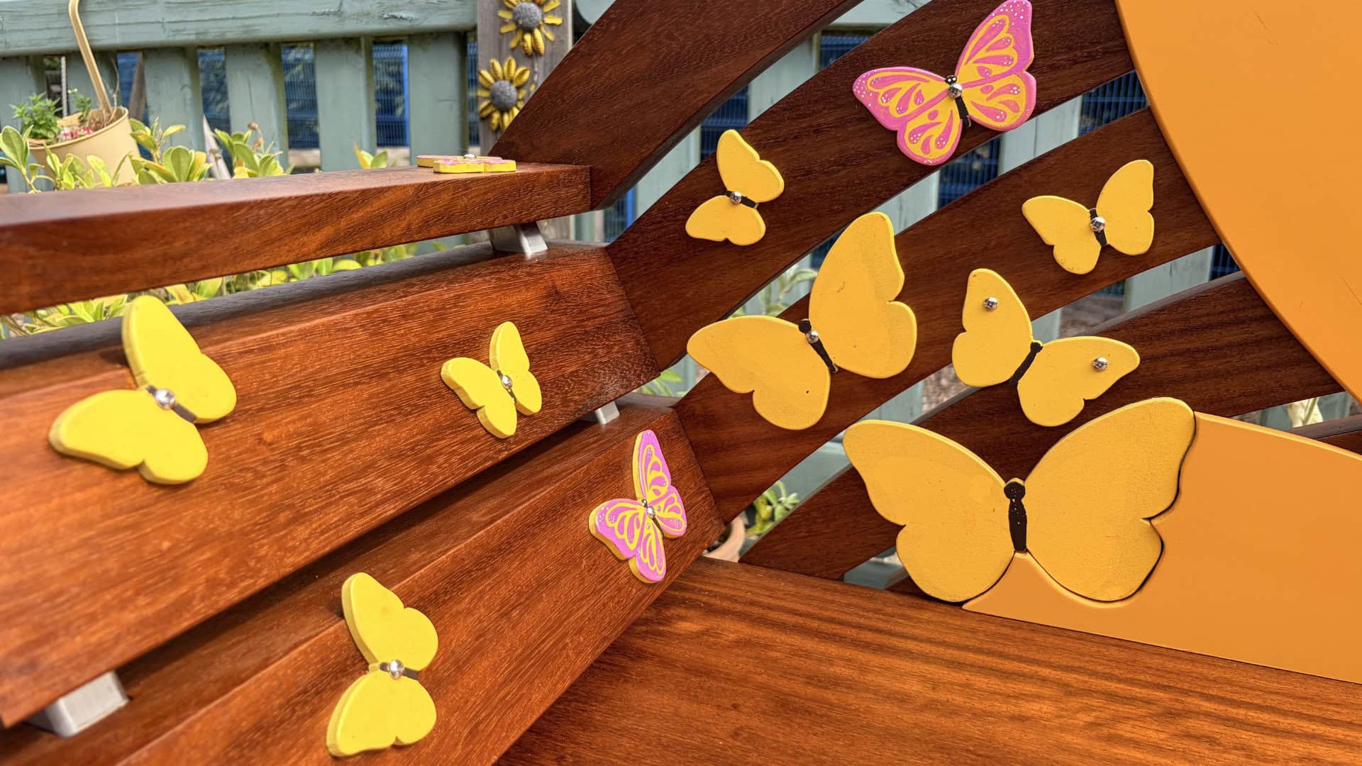Close up of butterfly detail on Zara's bench