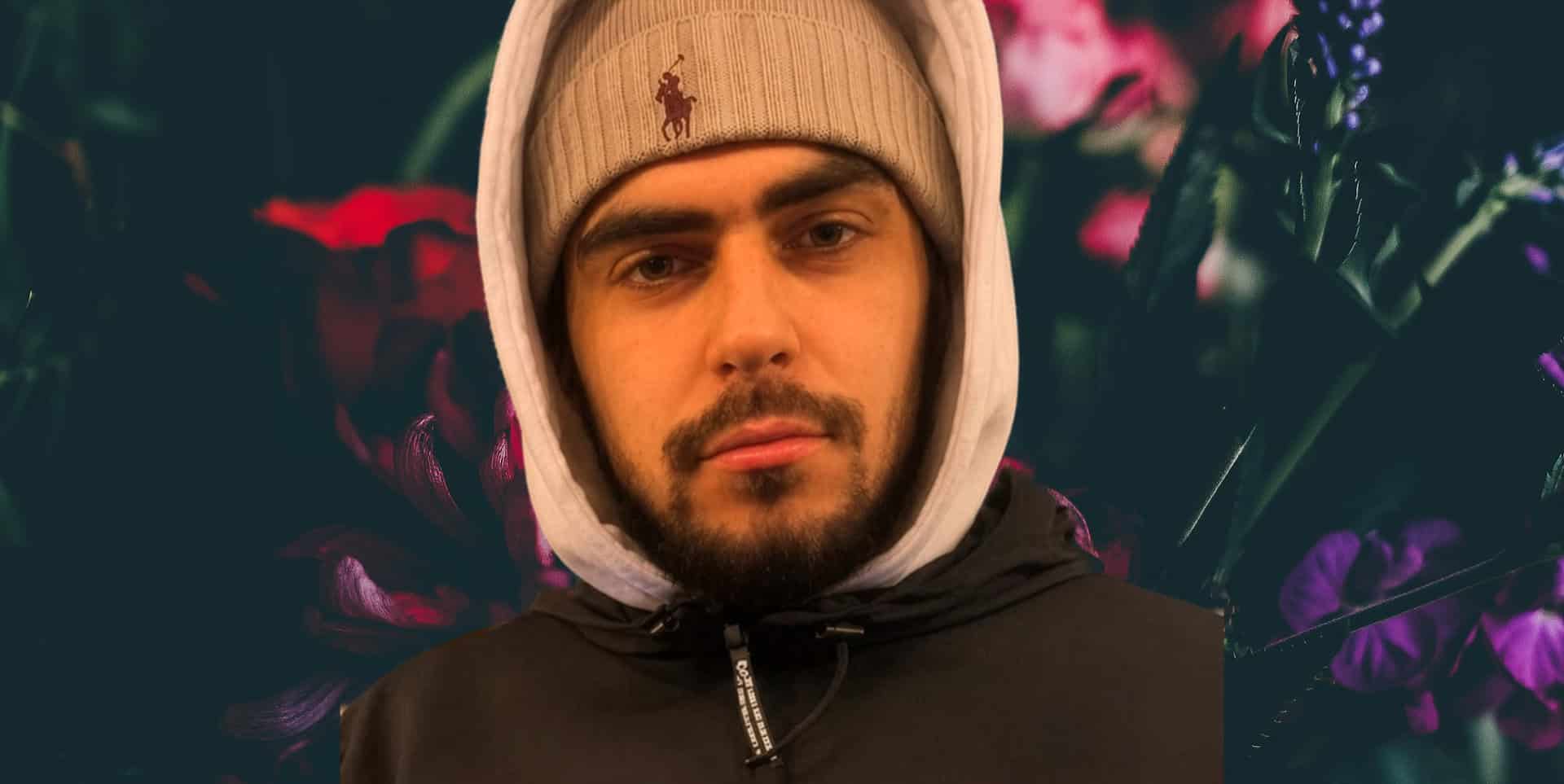Bouquet of flowers on a dark background with photo of Lucas Strutt on top