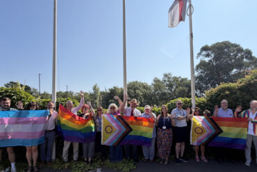 Councillors, Richard Quigley and IWC staff with the Pride Flag