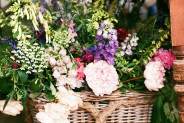 A variety of garden Flowers in a basket