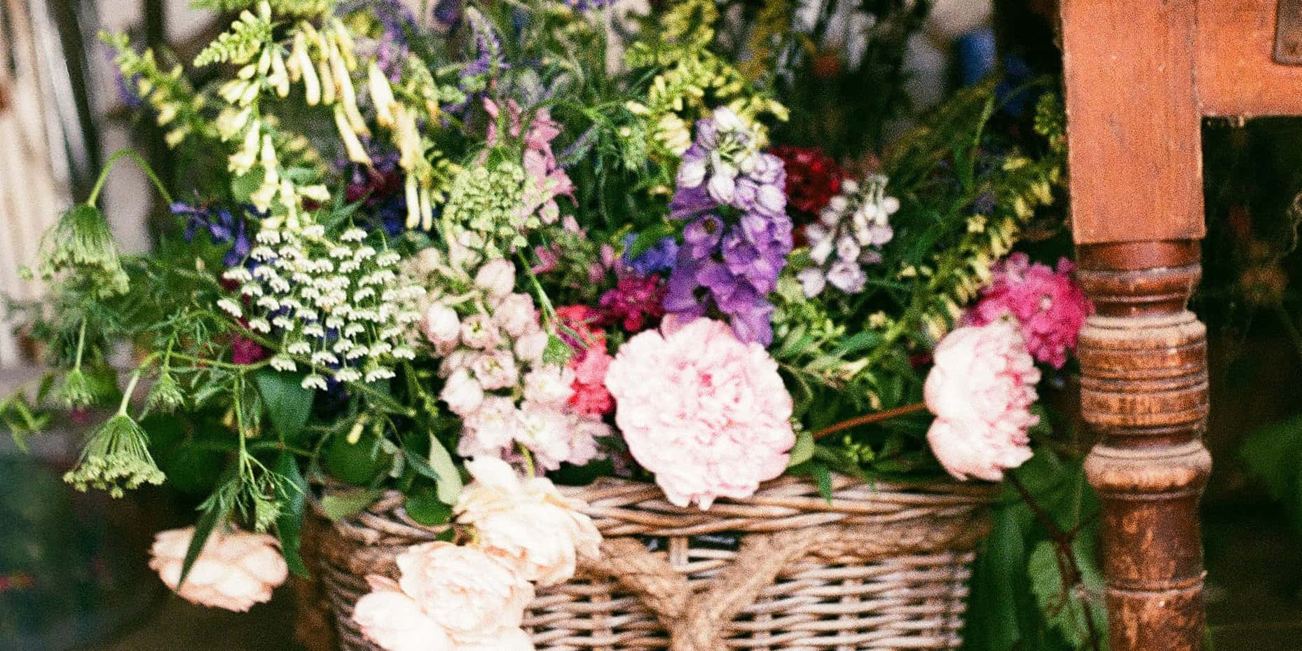 A variety of garden Flowers in a basket