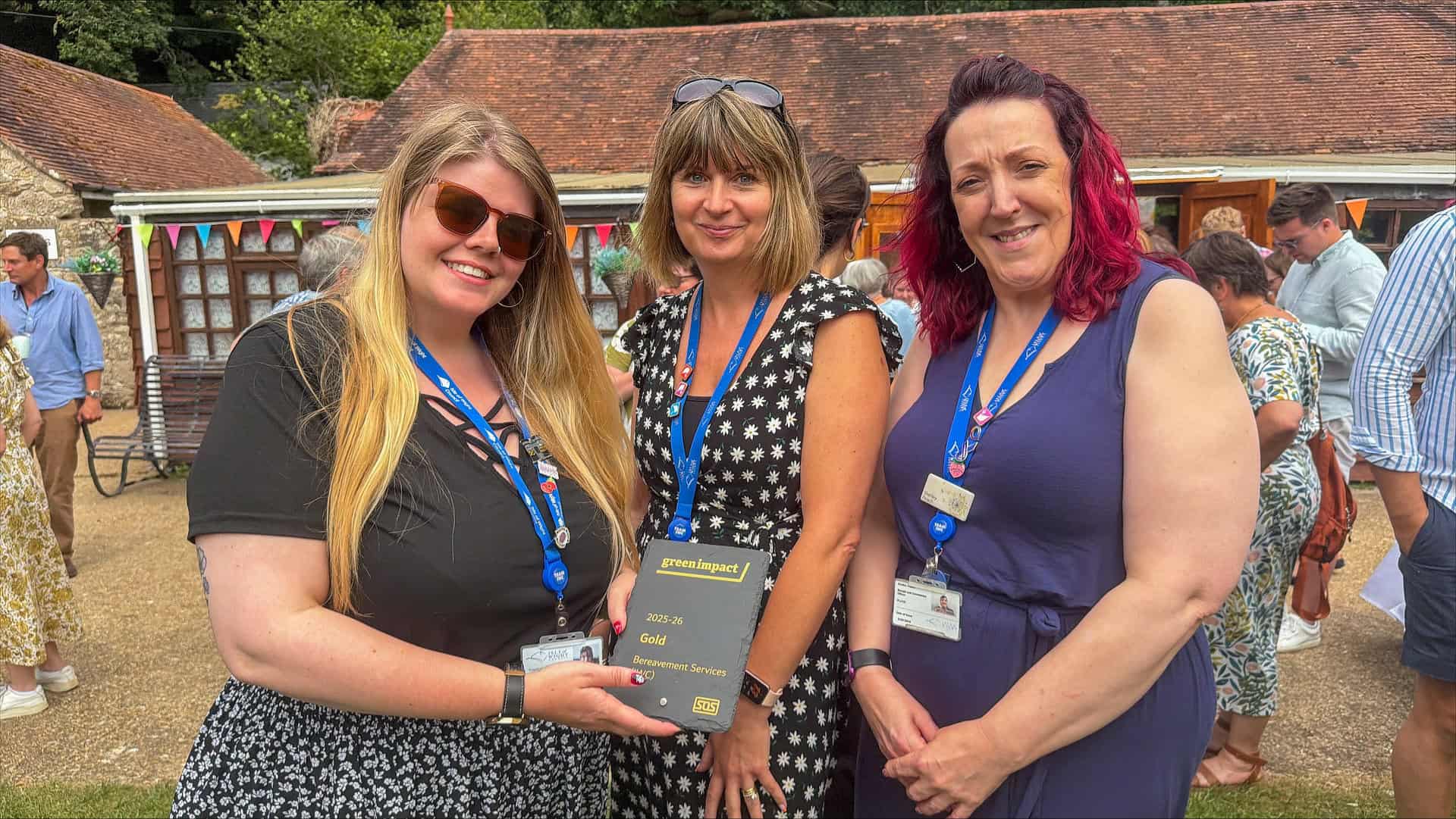 Members of the Isle of Wight Council's Bereavement Services team holding their Gold Green Impact award