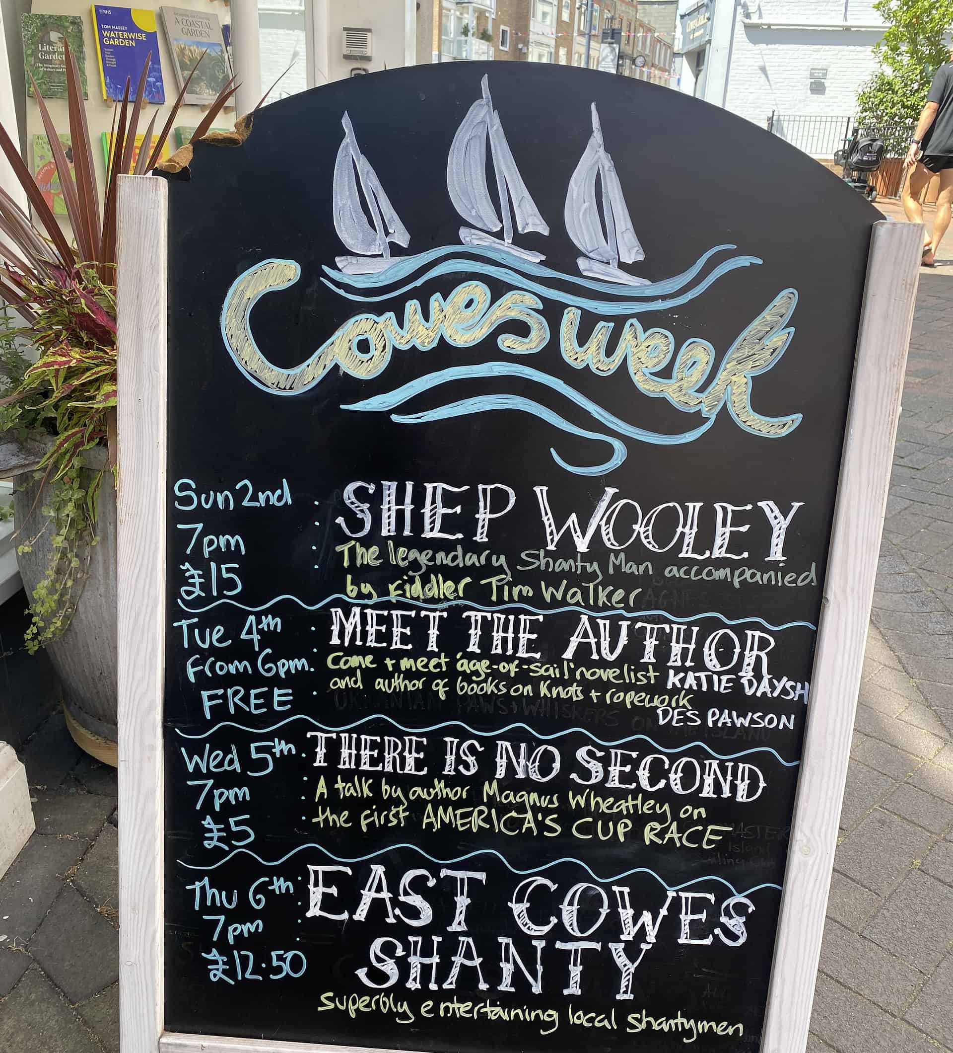Blackboard outside the bookshop with a list of events taking place
