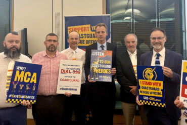 Joe Robertson and Richard Quigley with Coastguards