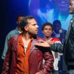 Refugee-led theatre company perform on stage