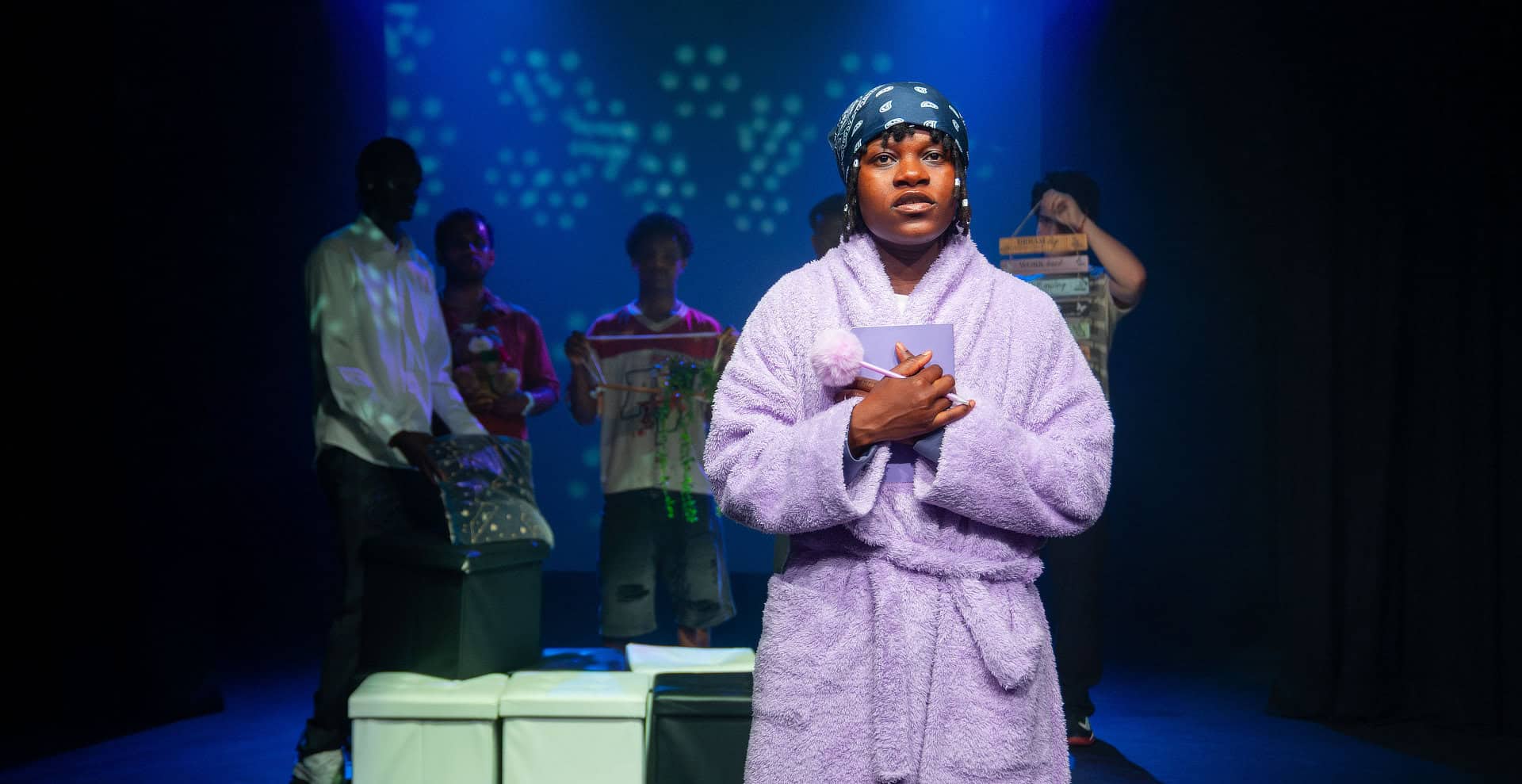 Refugee-led theatre company perform on stage