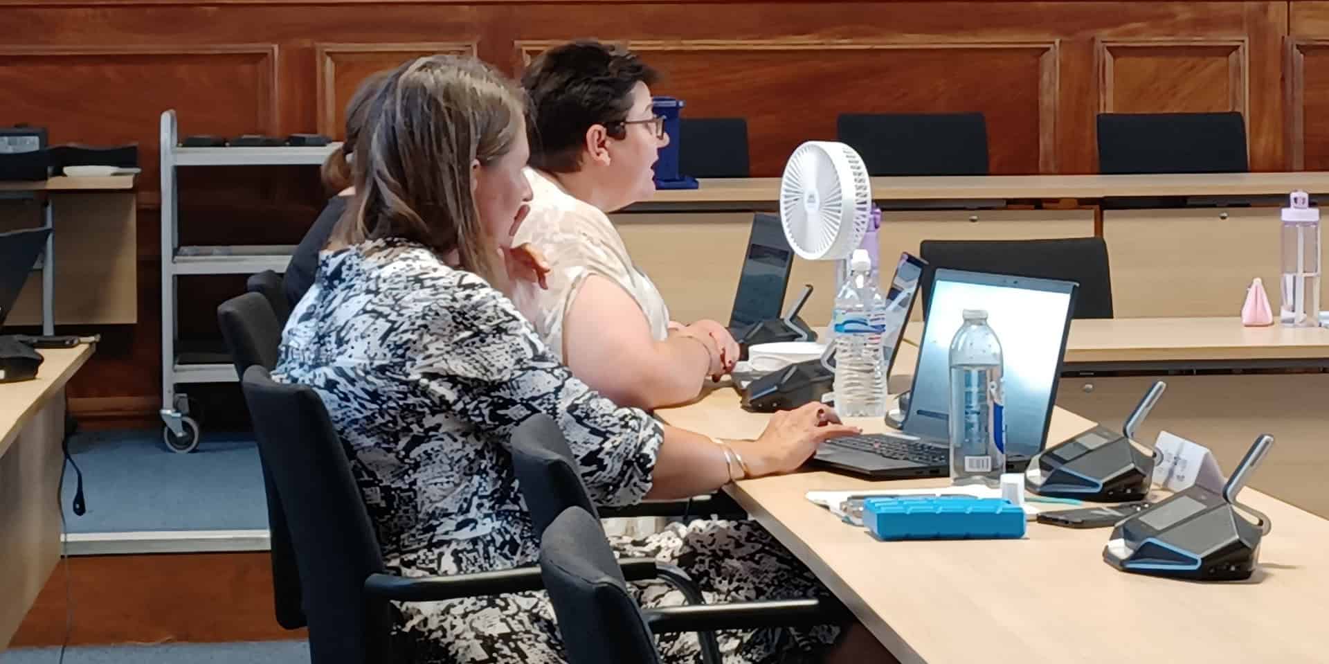 Laura Gaudion - centre right - in council chamber
