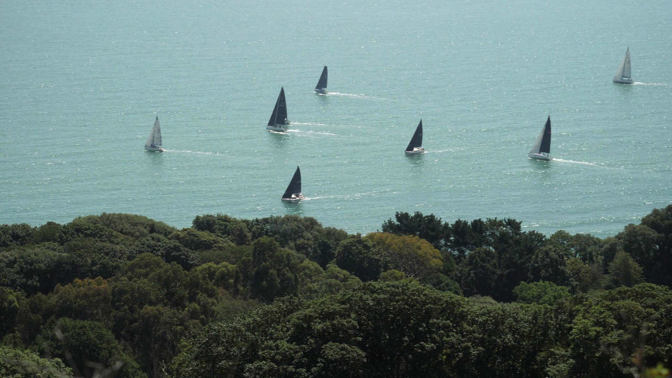 Boats passing Steephill Cove during Round the Island Race 2026