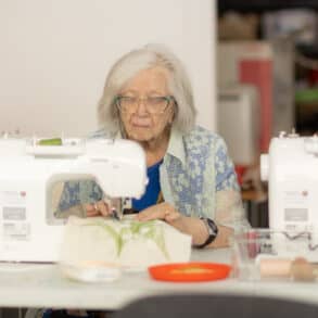 People sewing at Independent Arts by Julian Winslow