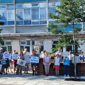 People standing outside county hall for Southern Water Protest