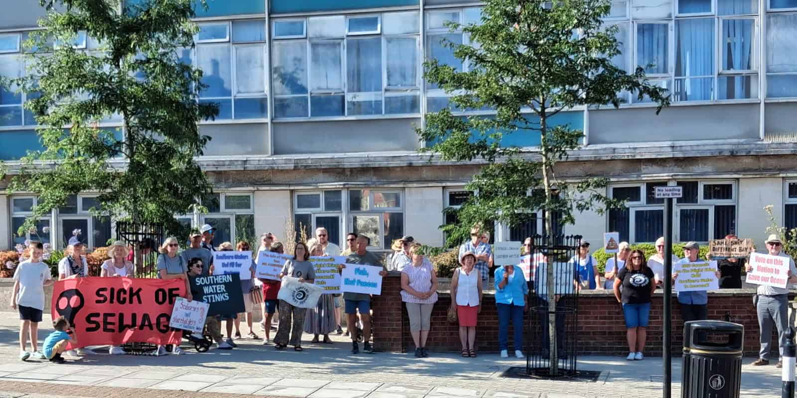 People standing outside county hall for Southern Water Protest