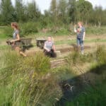 Volunteers working on the land at natuezones