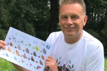 chris packham on butterfly count with identification card