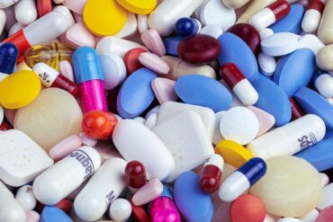 lots of different medication tablets and pills