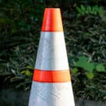 road cone on the back of a truck