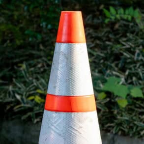 road cone on the back of a truck