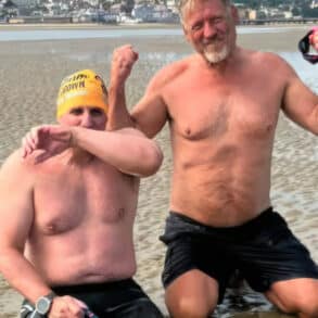 Simon Harmer and Mark Ryan on the beach