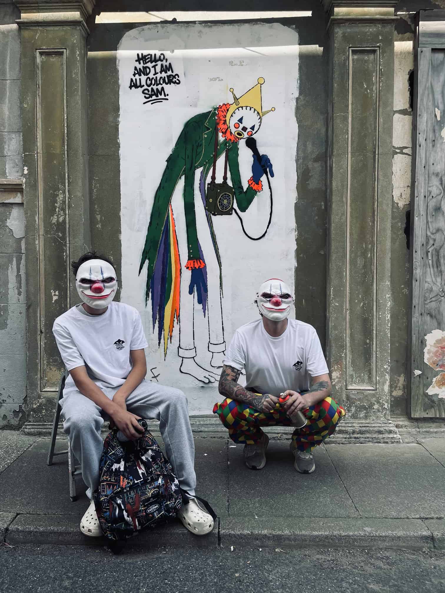Portrait of masked graffiti artists who worked on Sandown Clown street art