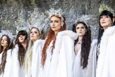The Mediaeval Baebes dress in white robes