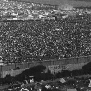 Black and white aerial photo of the 1970 Festival showing hundreds of thousands of people