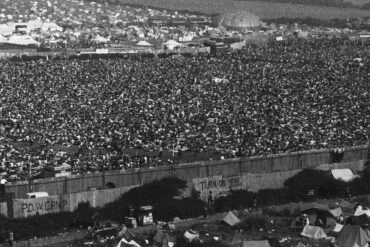 Black and white aerial photo of the 1970 Festival showing hundreds of thousands of people