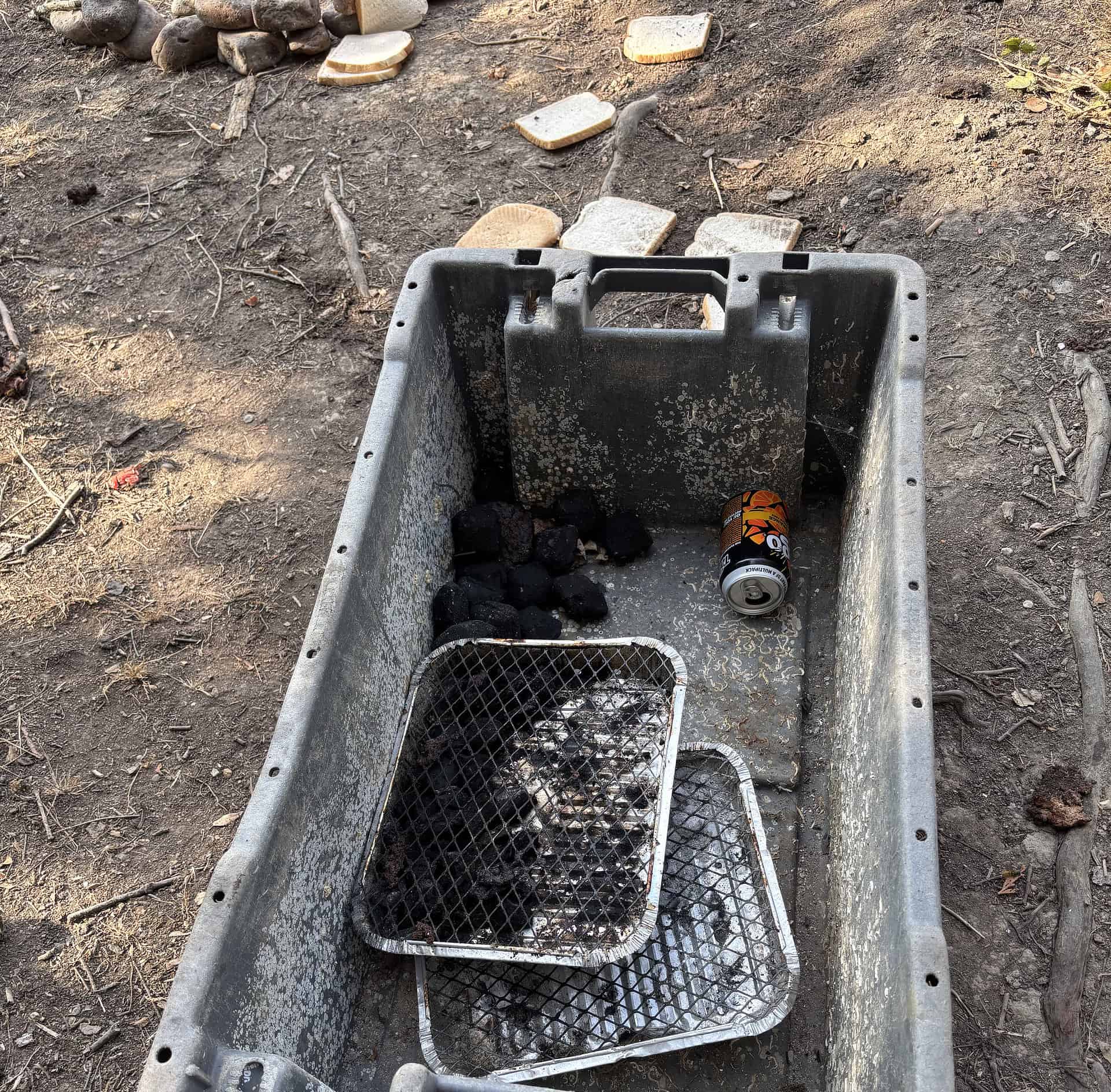 disposable BBQs in a plastic box in bouldnor forest