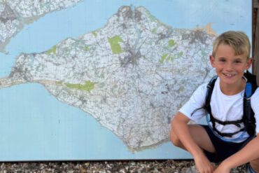 Charlie and a map of the Island