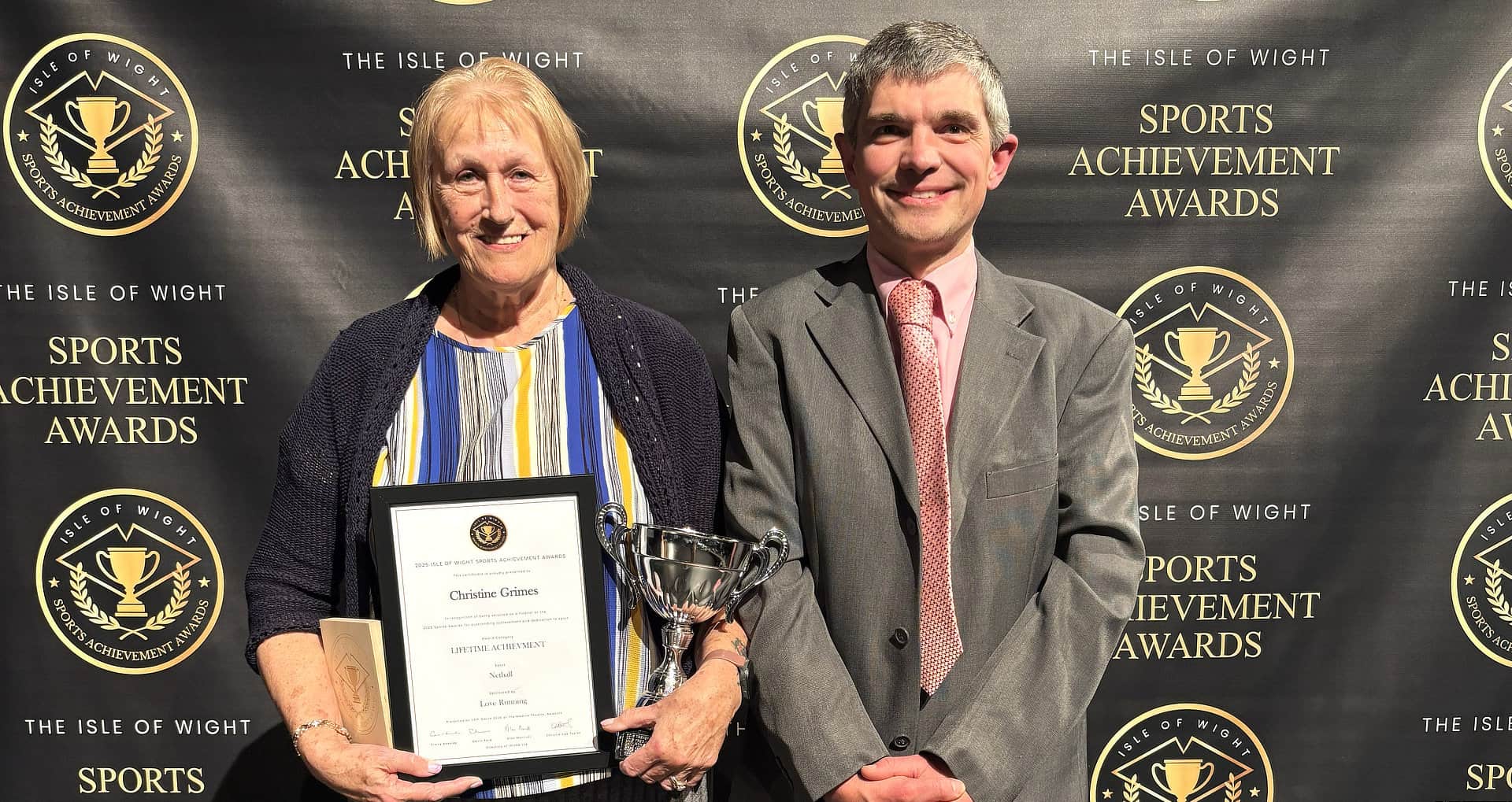 Christine Grimes with her award