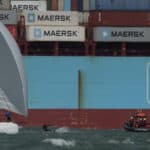 Huge container ship in the background with Gosport Lifeboat, a kitesurfer and a yacht in the foreground