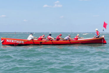 Traditional Gig Rowing team out on the water