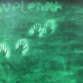 Green background with silhouette of hands and the words 'Wavelength'