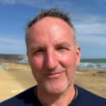 Jason de Caires Taylor standing on the beach