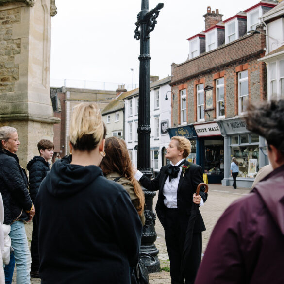 Charlotte at St Thomas's square speaking to walking tour audience