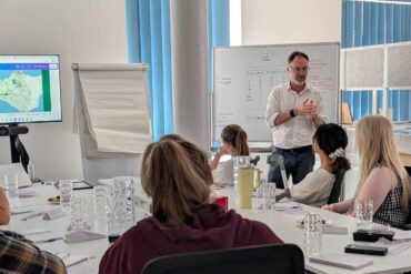 Richard Quigley MP speaking to bootcamp attendees on the first day of the programme