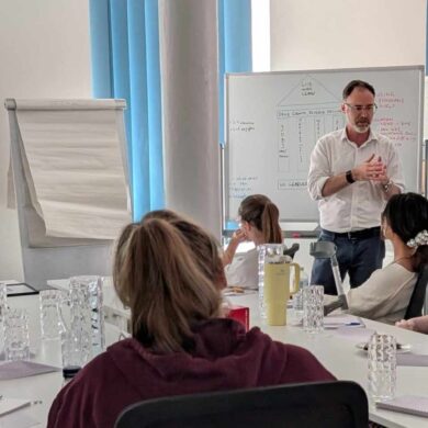 Richard Quigley MP speaking to bootcamp attendees on the first day of the programme