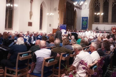 Choirs and audience at the totland concert